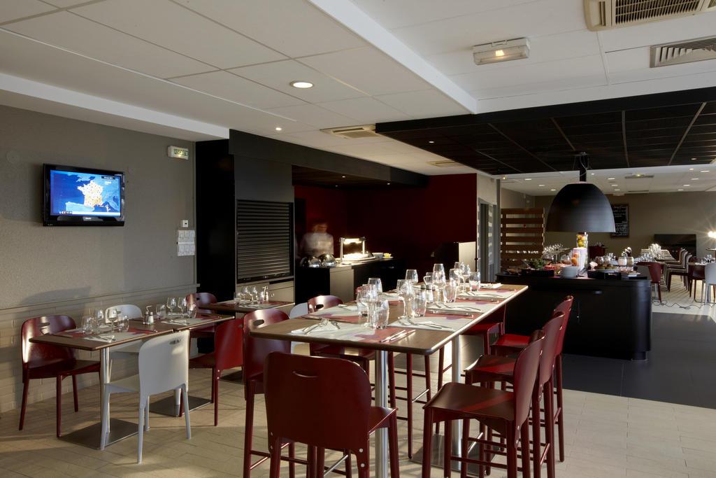 Campanile Saint-Quentin-En-Yvelines Hotel Montigny-le-Bretonneux Restaurant photo